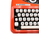 Machine à écrire hermes baby orange corail cursive révisée ruban neuf