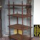 Napoleon III spool shelf, floor-standing shelf with brass tips.