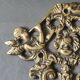 Putti musicians coat hook