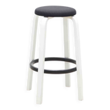 Alvar Aalto 64 stool upholstered in black and white for Artek.