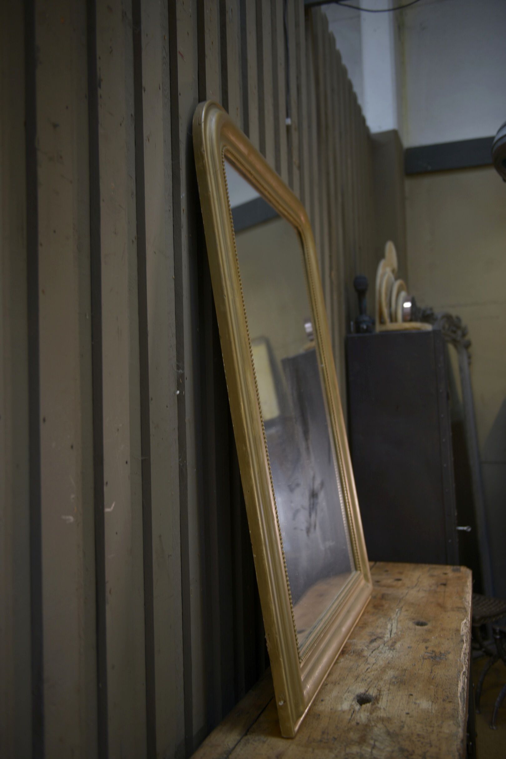 Old mirror in gilded wood 19th