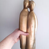 Brass statue stylized couple