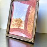 Metal frame in gold colored brass