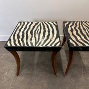 Striking pair of Italian zebra inlaid tessellated stone tables with refined curves