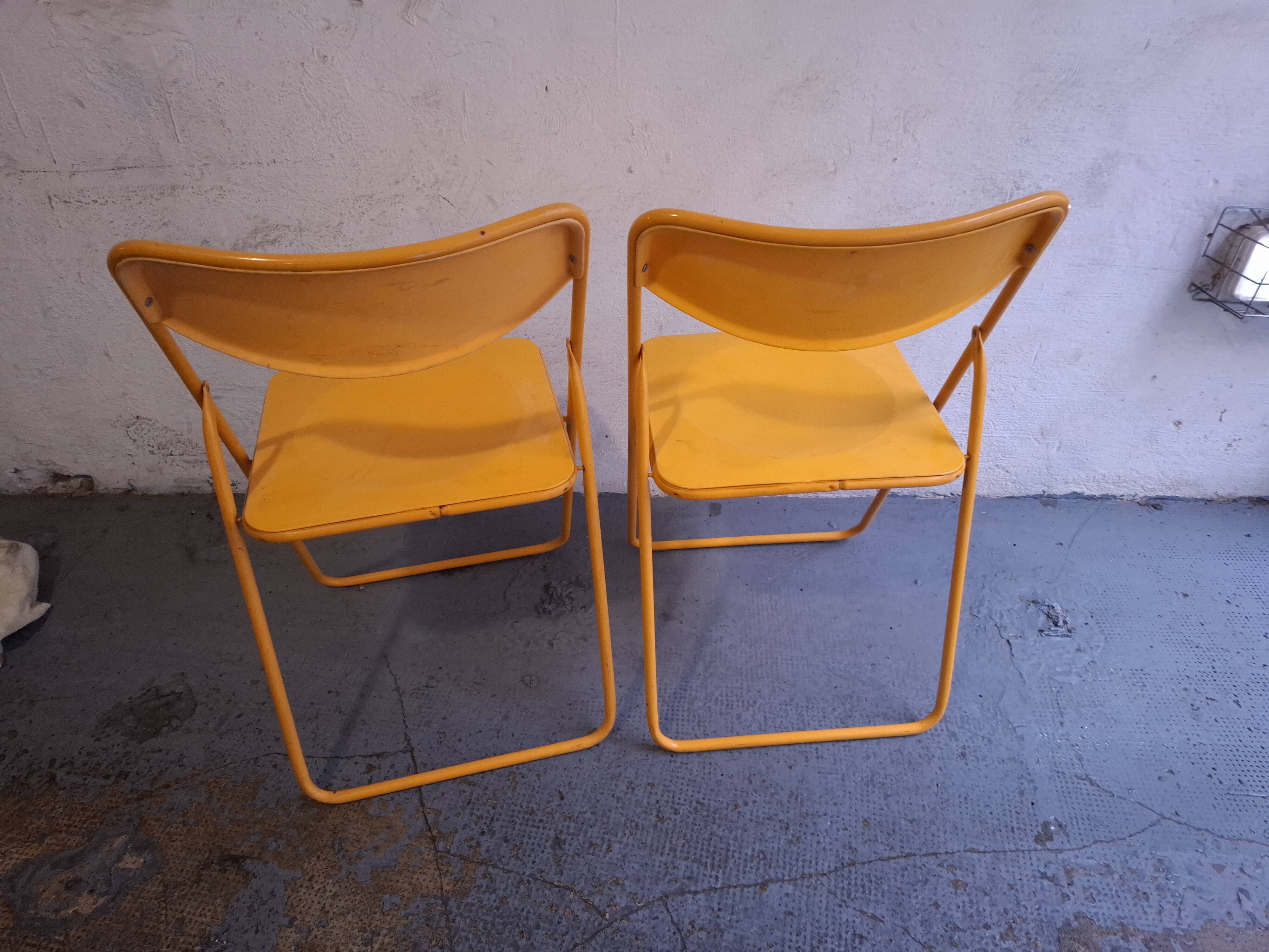 Two ikea folding chairs, niels gammelgaard