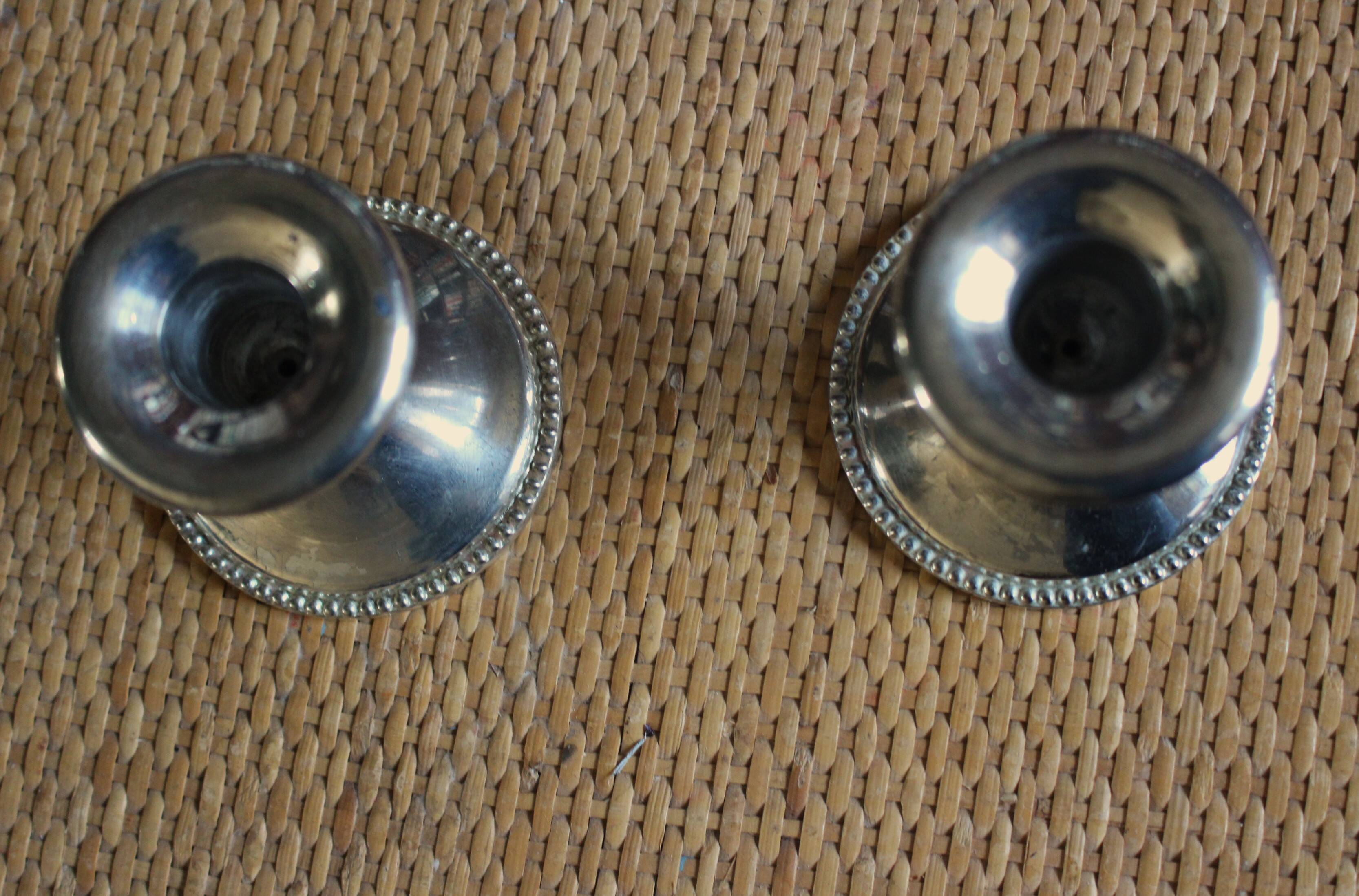 Pair of chrome metal candlesticks