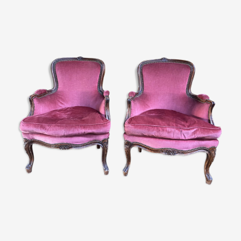 Paire de fauteuils bergères style Louis XV velours rouge