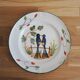 Old hand-painted ceramic plate: 2 birds on a fence.