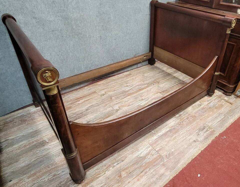 Rare Empire period mahogany bed with gilt bronze profiles circa 1800