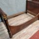 Rare Empire period mahogany bed with gilt bronze profiles circa 1800