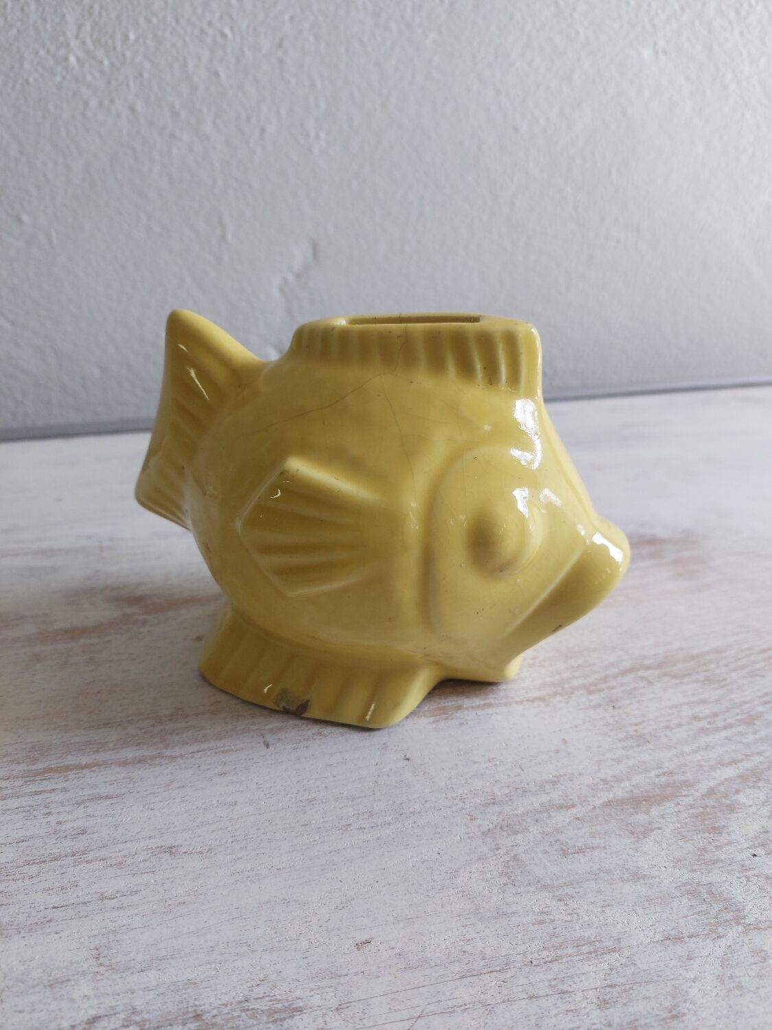 Ceramic piggy bank in the shape of a fish