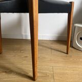 Vintage chair in wood and black leatherette