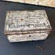 Old metal and wood medicine box with key
