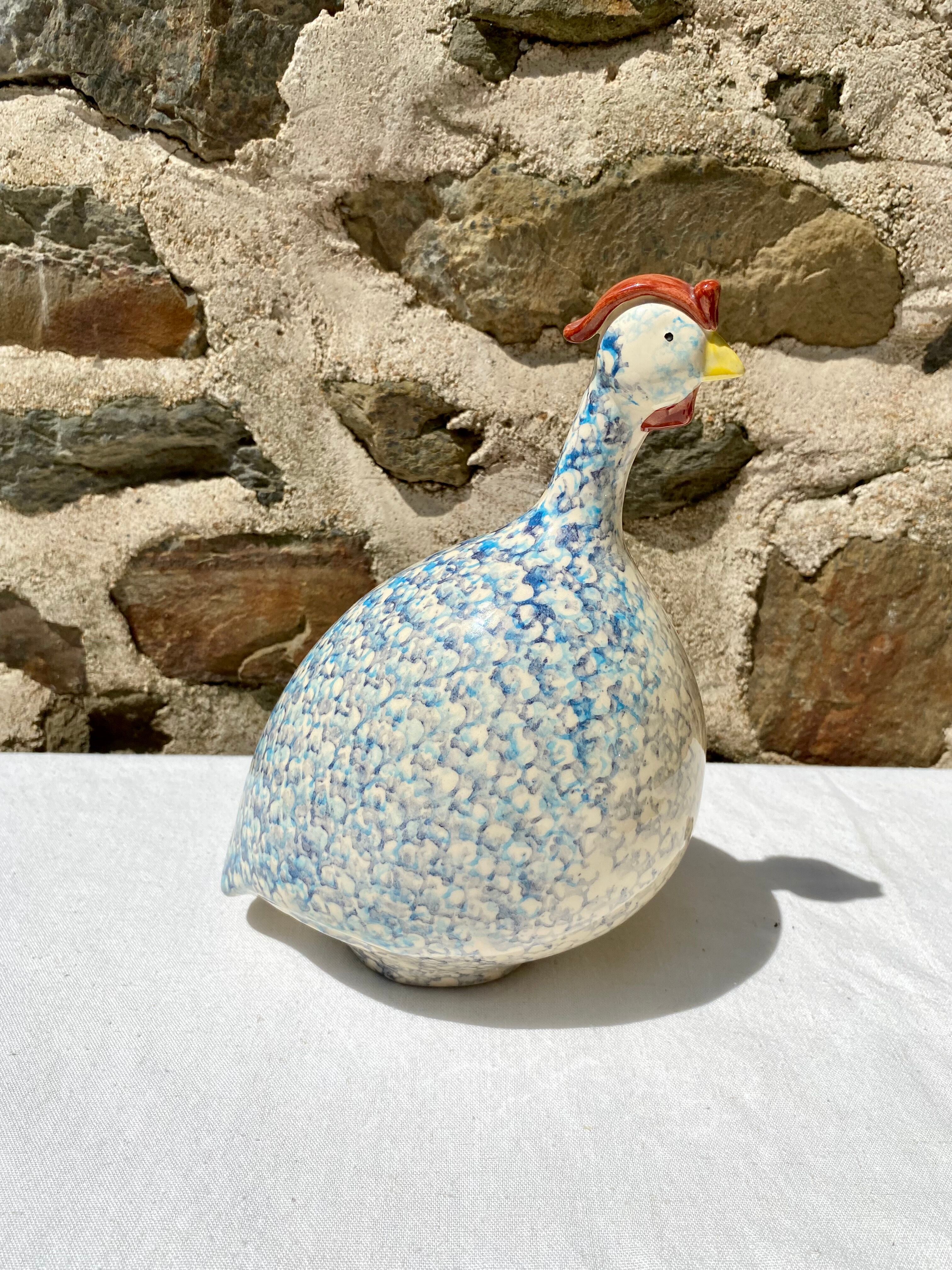 Signed ceramic hen and guinea fowl