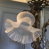 Old brass chandelier with tulips