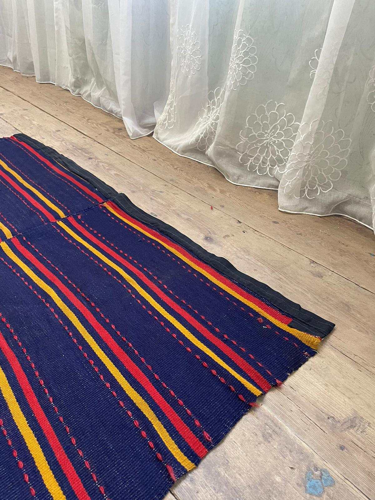 Romanian rug handwoven in wool, purple background with red and yellow stripes 183x133cm
