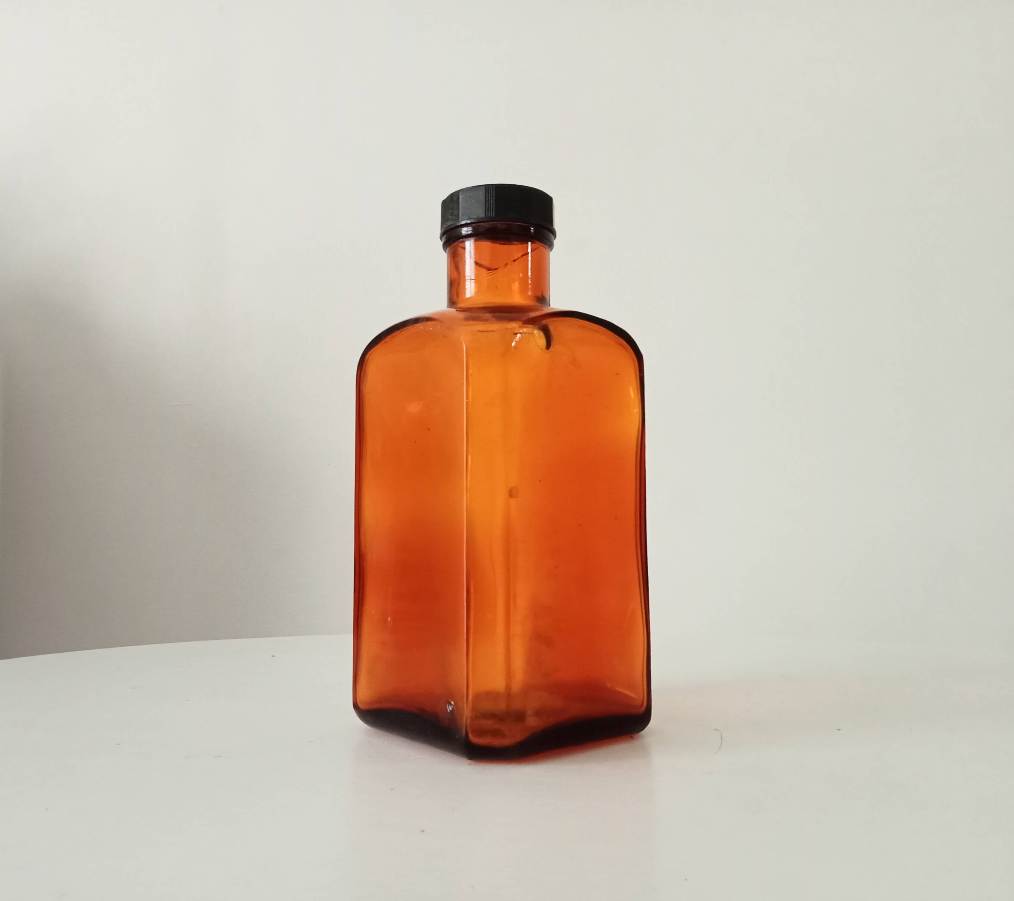 Old amber pharmacy bottle