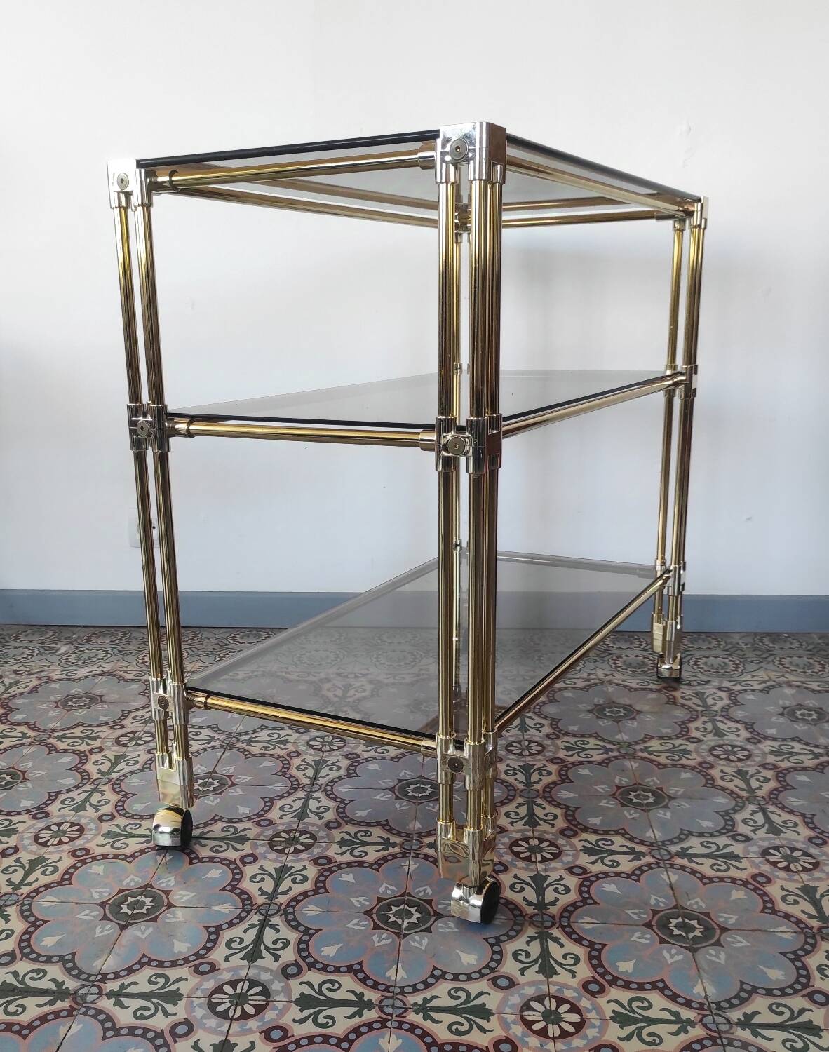 Dessert, vintage gold rolling bar, chrome and smoked glass.