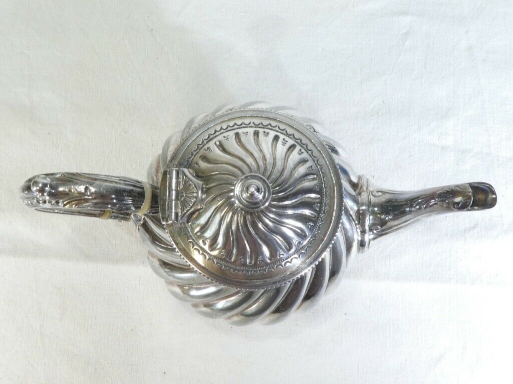 Silver flat silver metal teapot