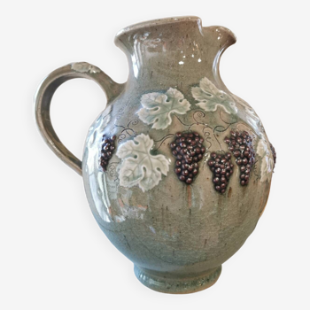 Pitcher decorated with bunches of grapes