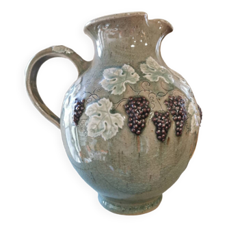 Pitcher decorated with bunches of grapes