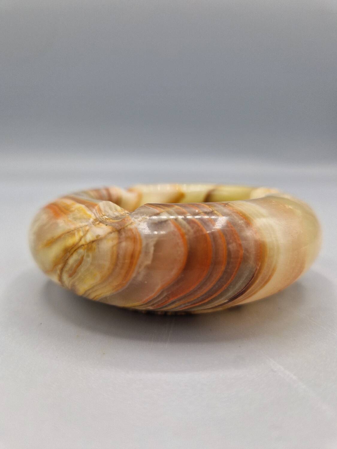 Small vintage onyx ashtray with three rests