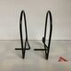 Pair of black metal bookends A