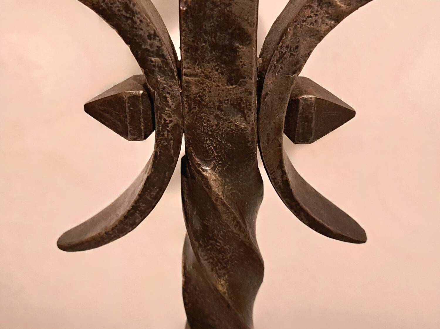 Black wrought iron fleur-de-lis candlestick