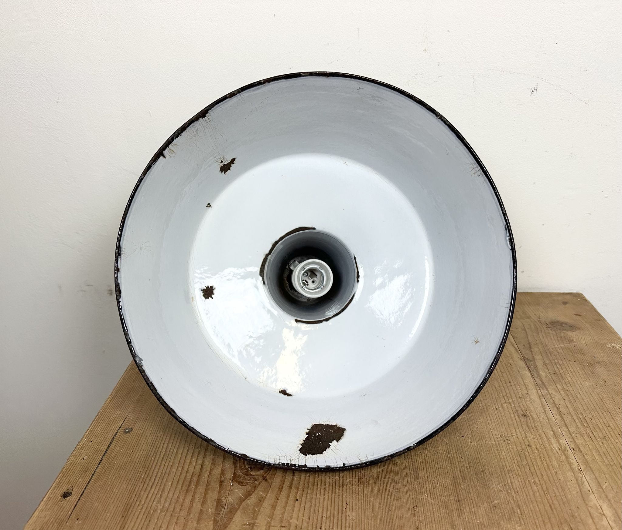 Industrial black enamel factory lamp with cast iron top, 1960s
