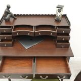 A desk with an English-style chair. After professional renovation.