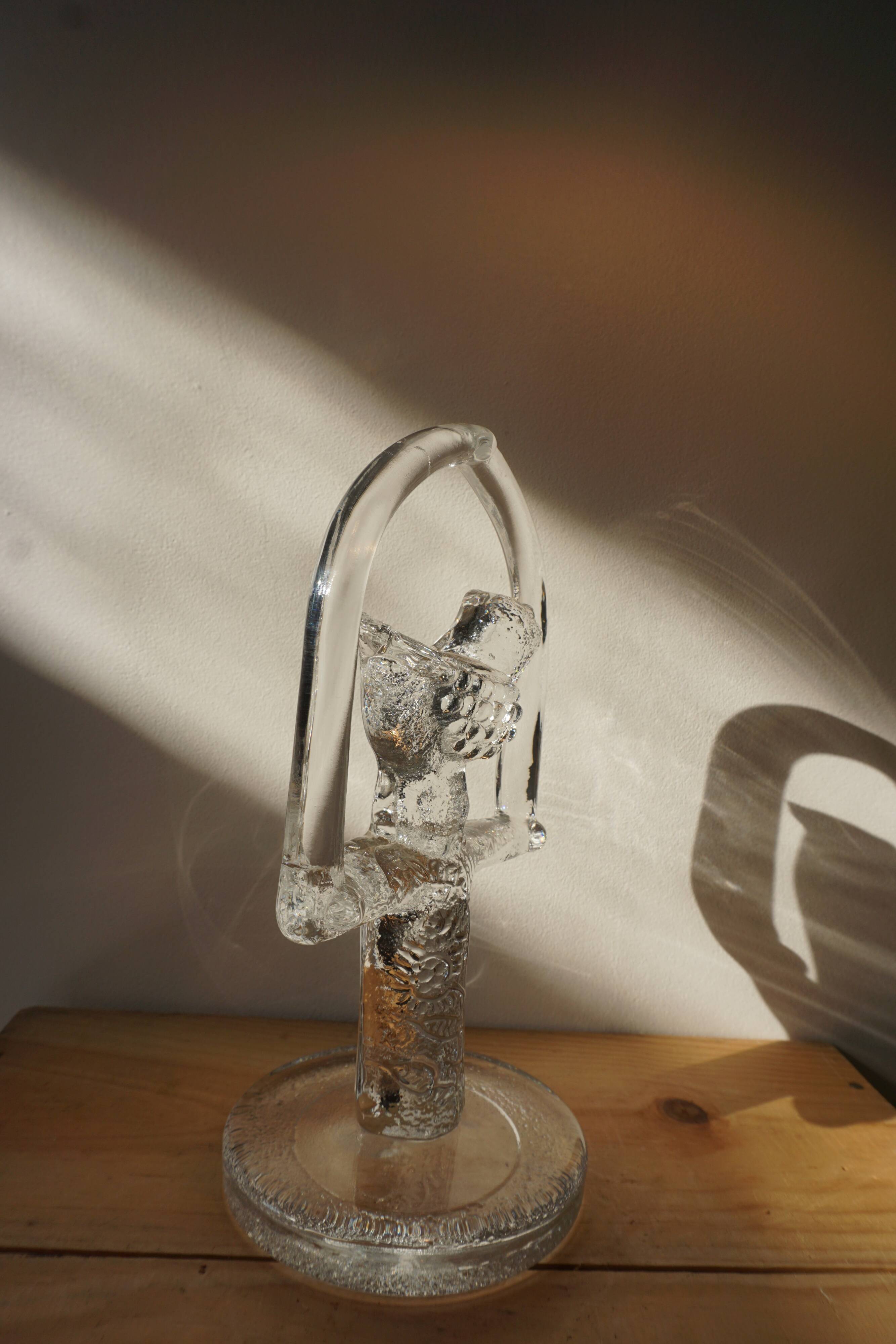 Glass bird suncatcher sculpture