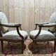 Pair of cabriole armchairs with medallion backs from the Louis XVI period, stamped OT.