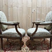 Pair of cabriole armchairs with medallion backs from the Louis XVI period, stamped OT.