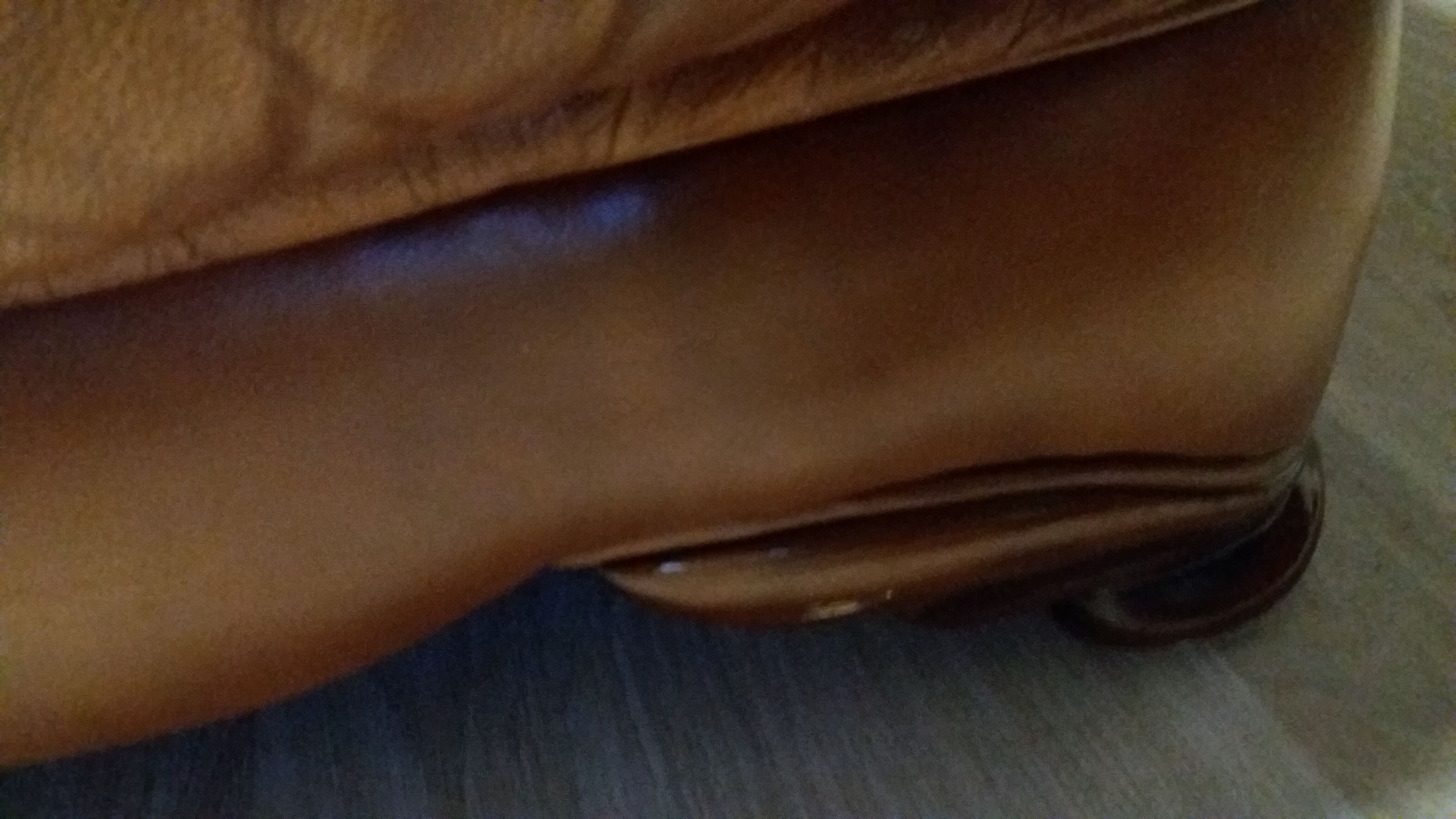 Brown leather armchair