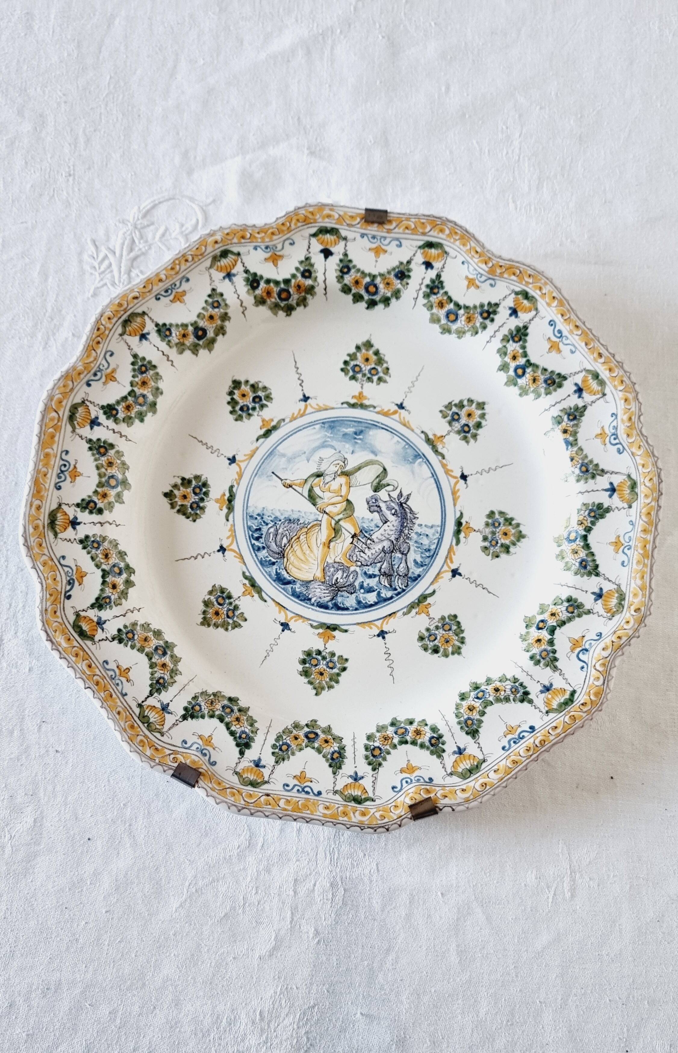Antique plate in Moustiers faience, hand-painted, decorated with an s