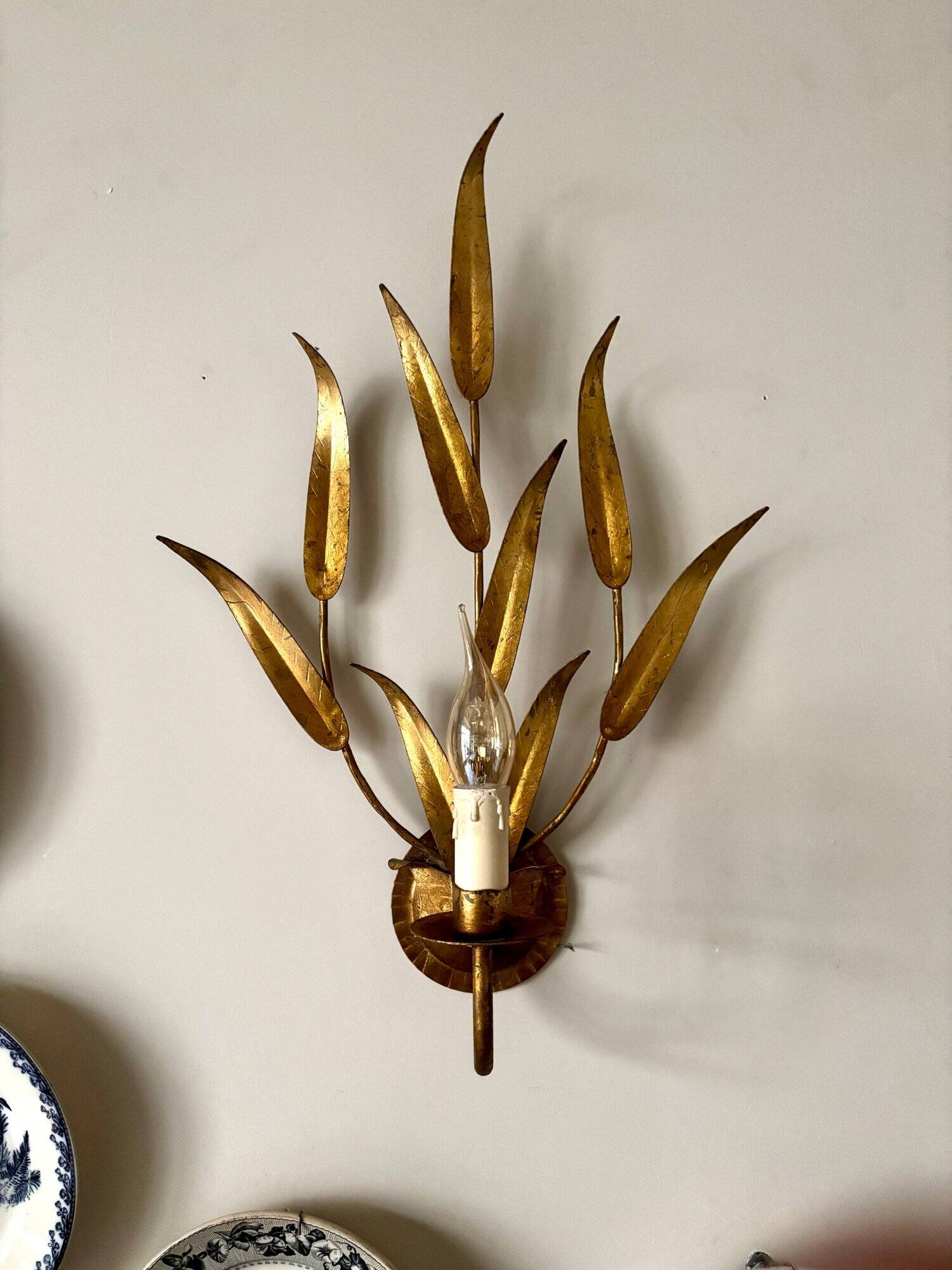 Gold metal leaf wall light