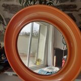 Italian orange round mirror from the 70s by Collezione SALC
