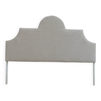 Headboard of 160 upholstered in a textured beige fabric.