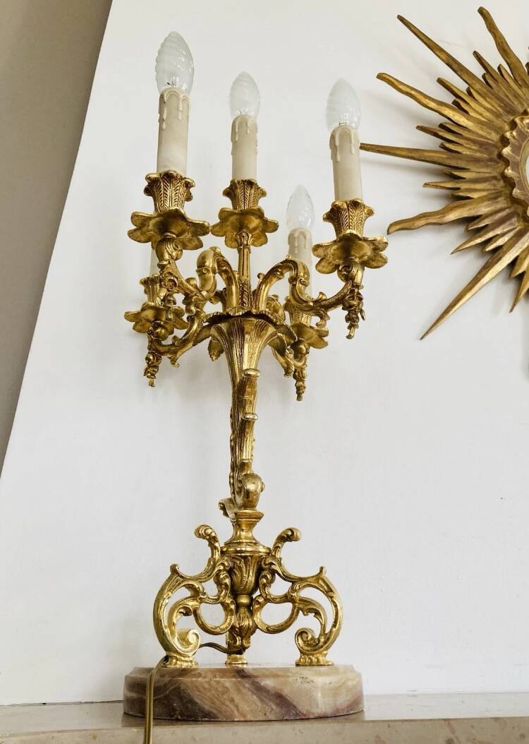 Pair of gilt bronze chandeliers, marble bases.