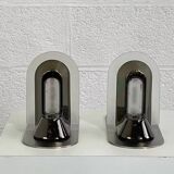 Pair of vintage stainless steel and glass wall lights