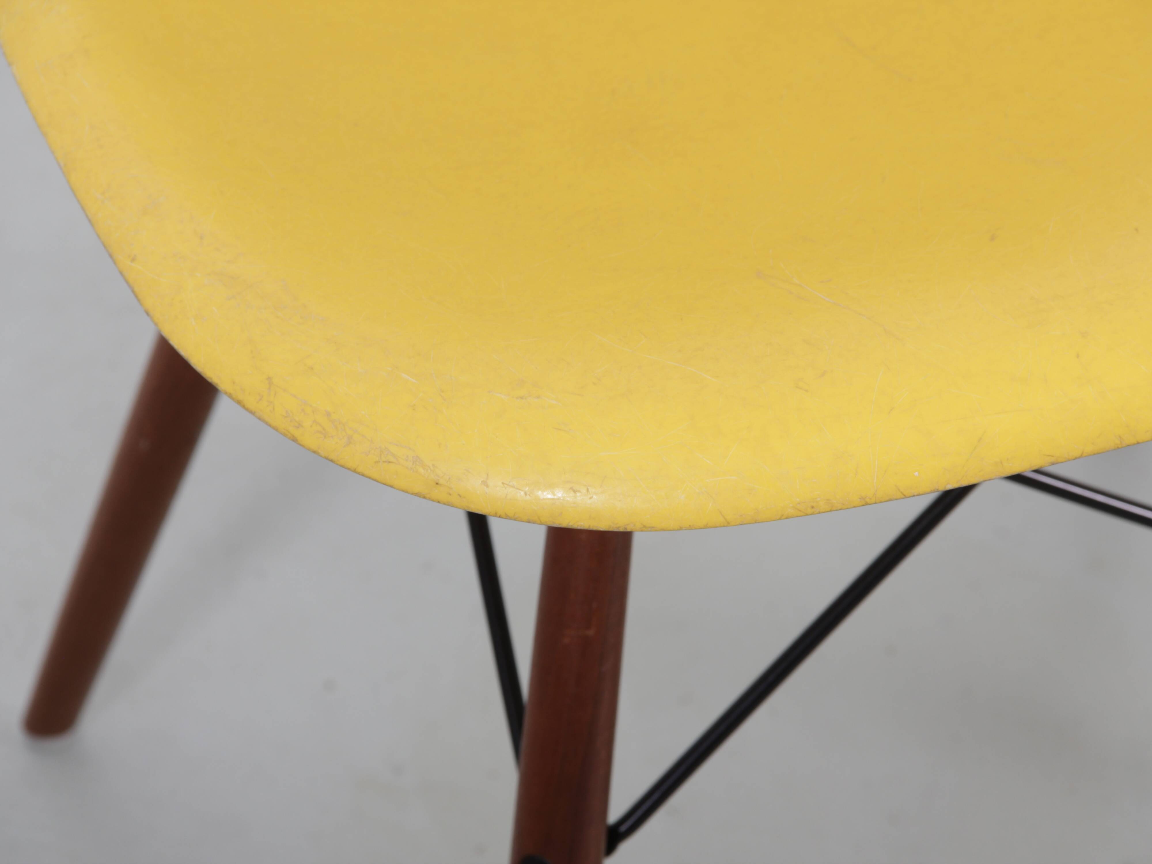 Set of 4 DSW chairs by Charles Eames - yellow fibreglass edition by Herman.