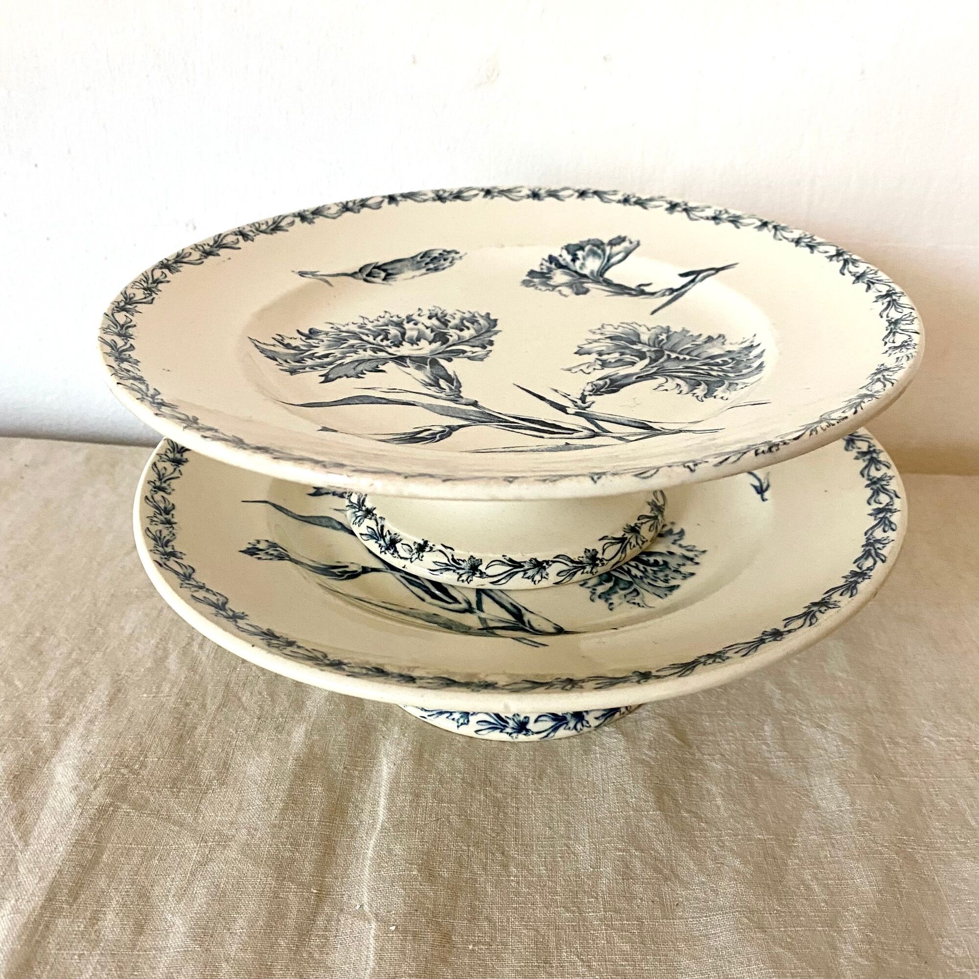 Antique dishes on foot in Luneville carnation porcelain