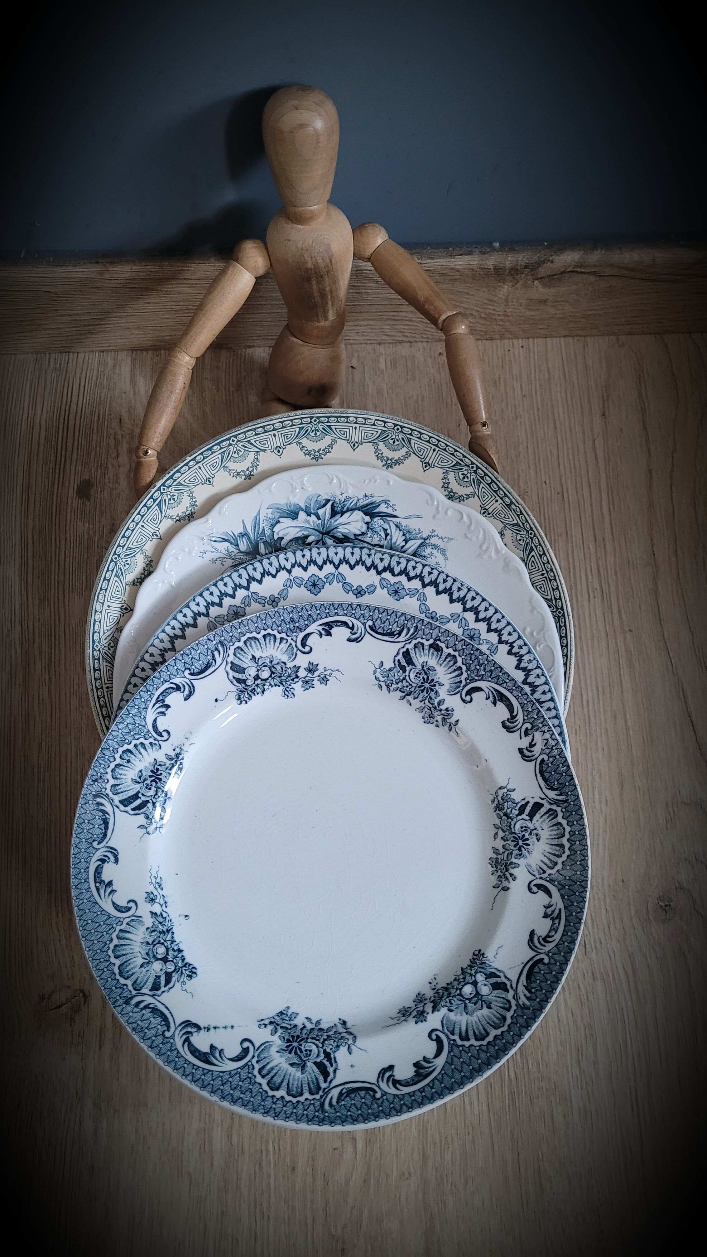 Quartet of mismatched blue plates