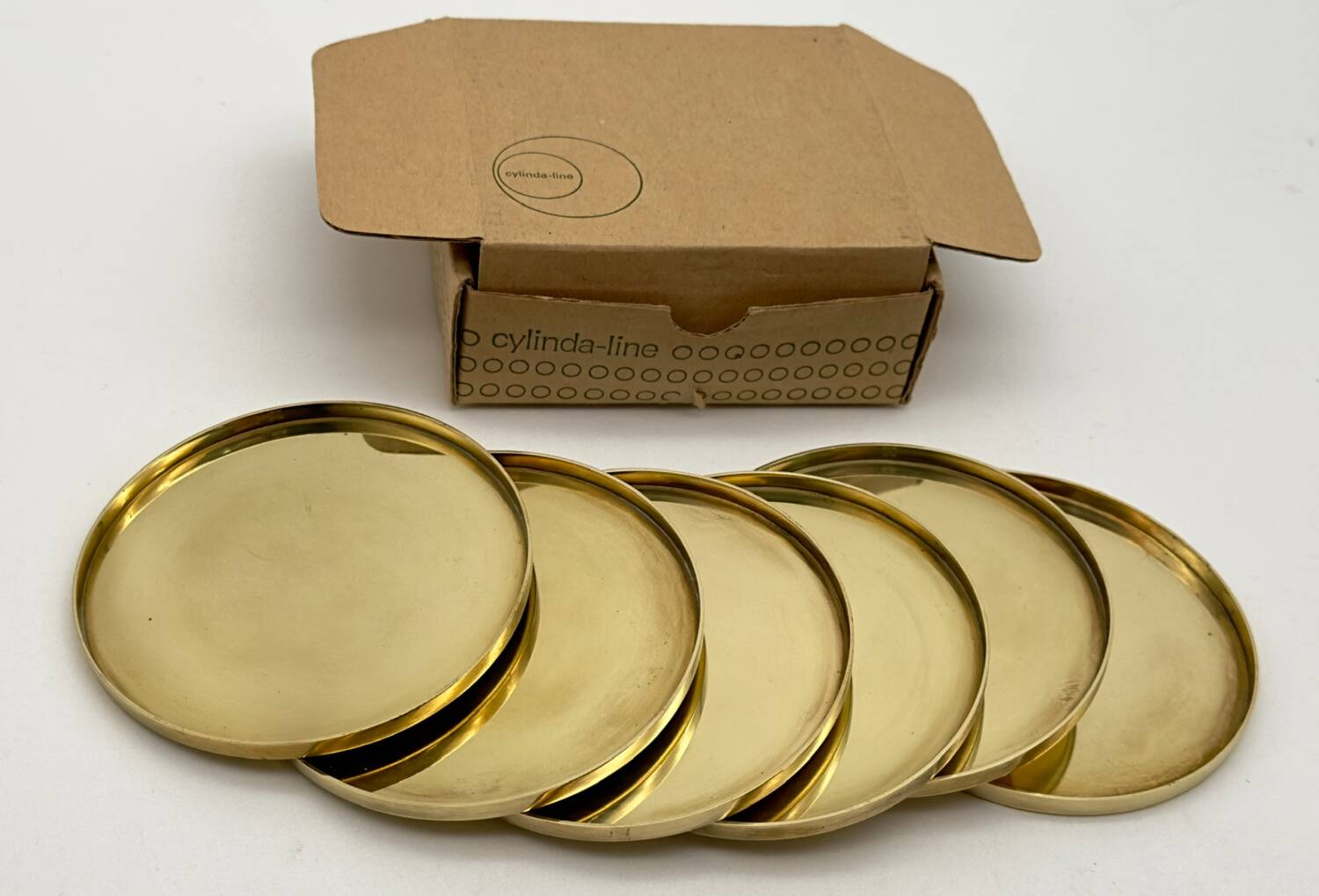 6 Coasters. Stelton. Brass