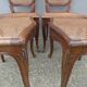 4 caned wooden chairs