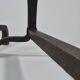 Pair of handforged metal and brass andirons