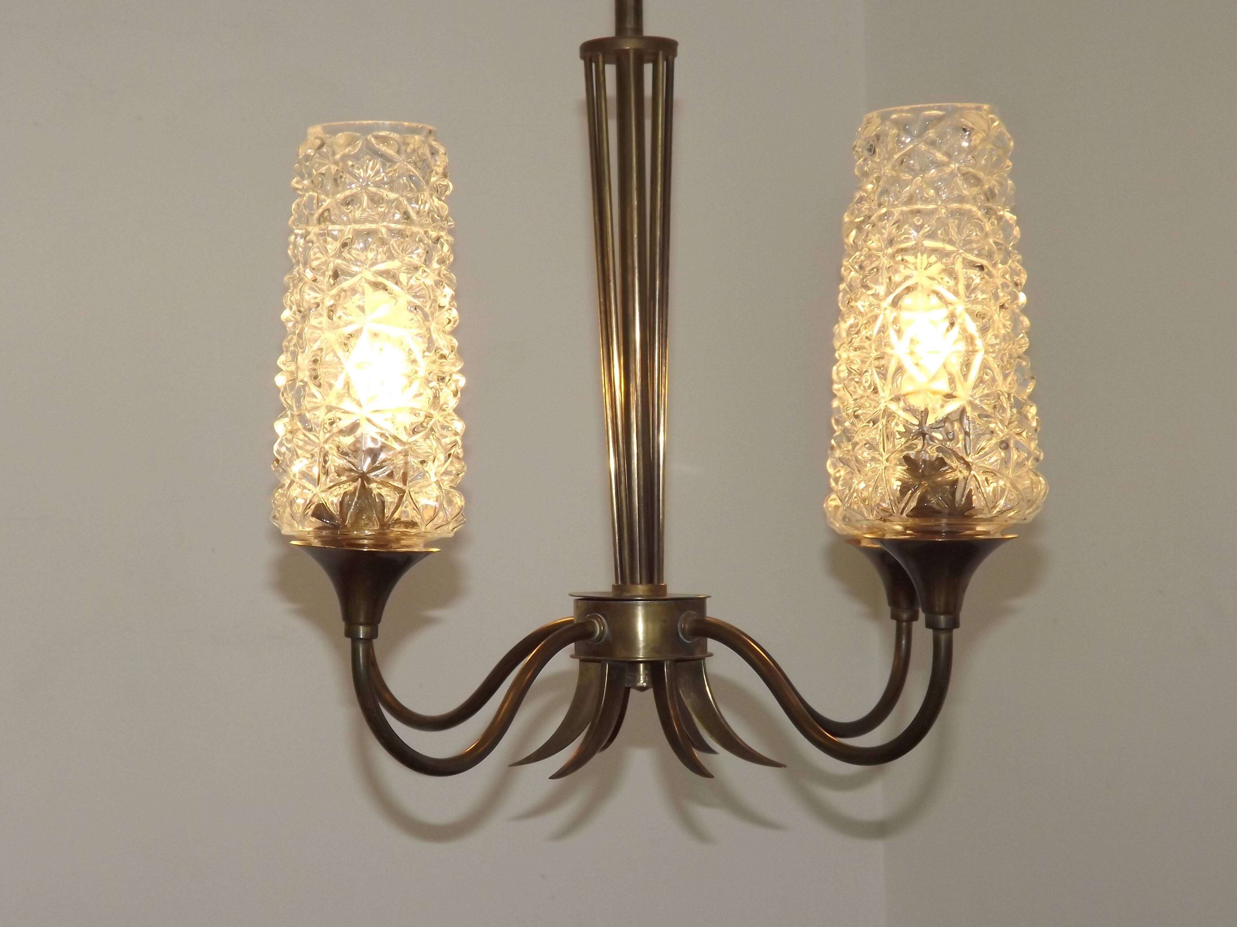 French vintage retro chandelier with 4 lights in brass and bronze with cut glass shades.