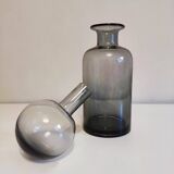 gray glass carafe with stopper