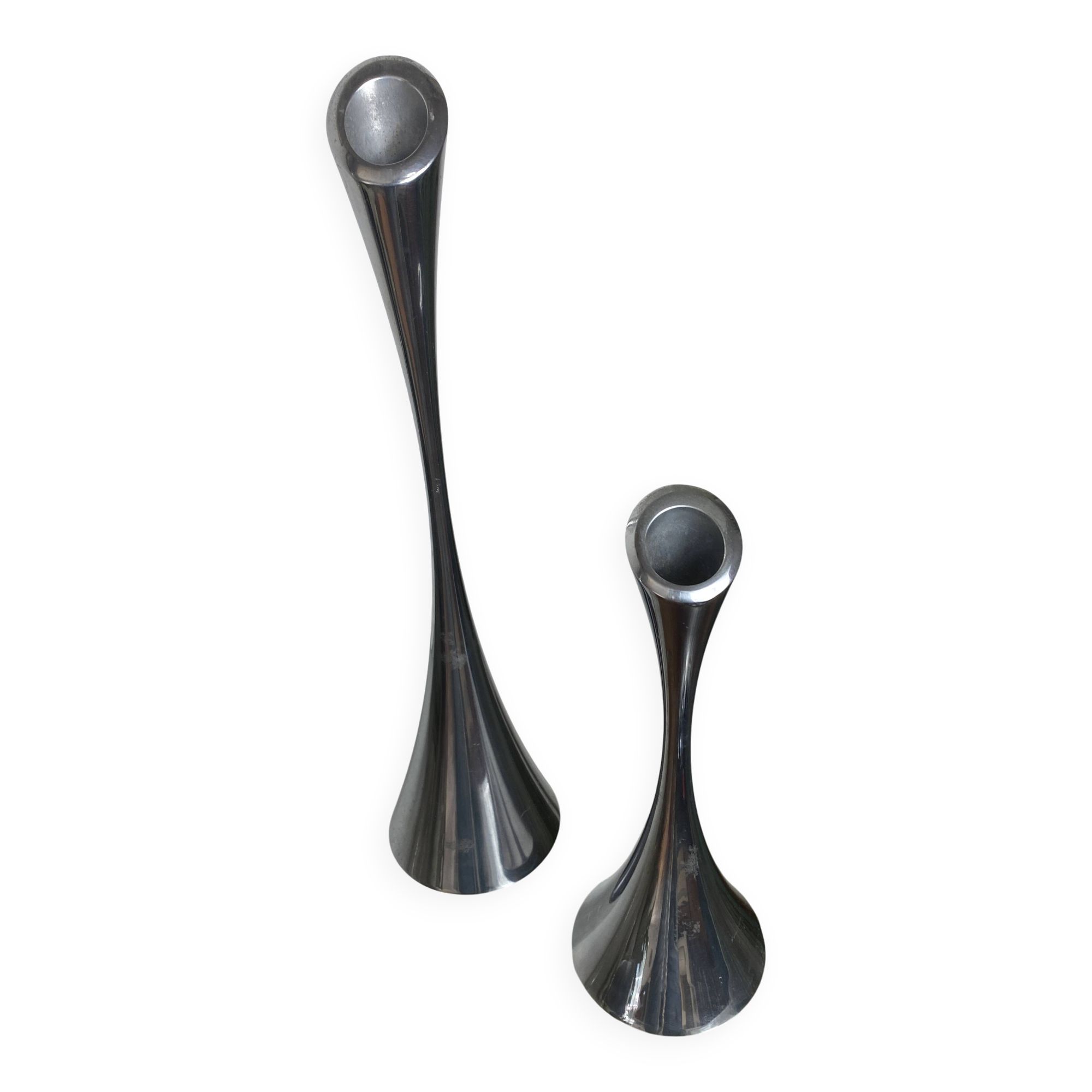 Pair of designer candle holders in stainless steel