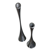 Pair of designer candle holders in stainless steel